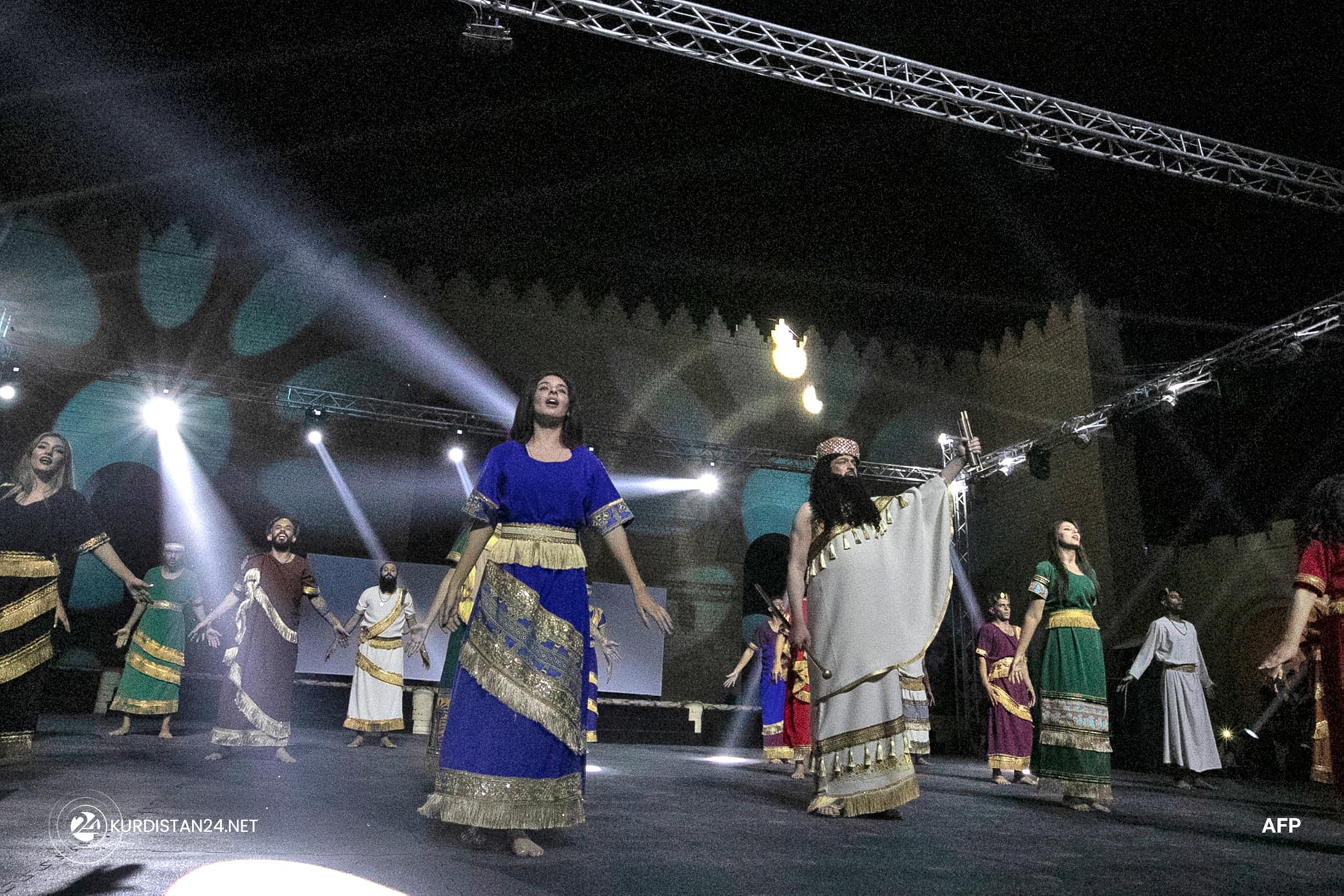 Artists perform during the launching ceremony of Babel International Festival, at the archaeological site of ancient Babylon, Oct. 28, 2021. (Photo: Sabah Arar/AFP)