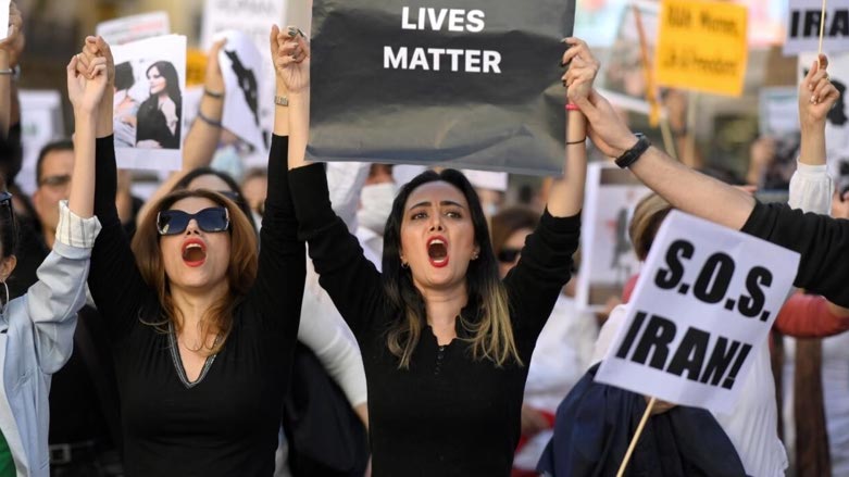 Protesters in support of Kurdish woman Mahsa Amini rally in Madrid on Saturday, part of a global wave of solidarity demonstrations (Photo: OSCAR DEL POZO AFP/File)