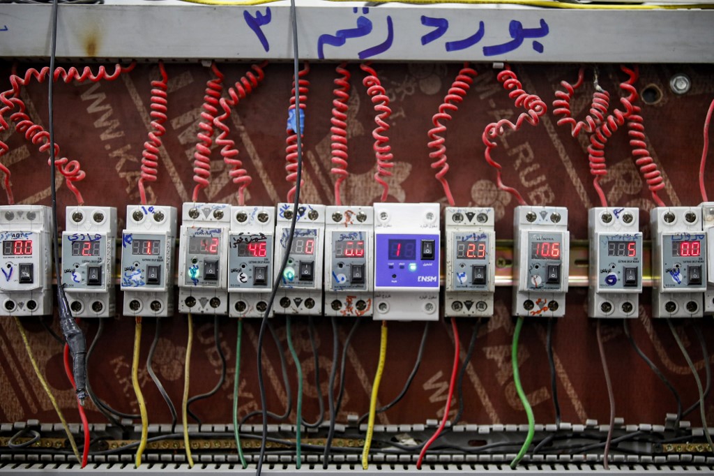 a view of the switches of clients subscribing for electrical power delivery to a battery of fuel-based electricity generators in the eastern Sadr City suburb of Iraq's capital Baghdad., Sept. 27, 2022. (Photo: Ahmad Al-Rubaye/AFP)