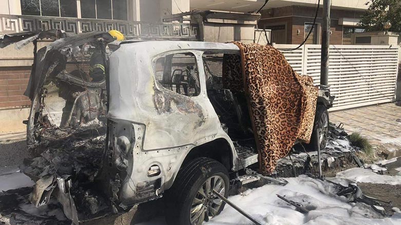 The burnt down vehicle of the KRSC officer in Erbil pictured after the explosion, Oct. 7, 2022. (Photo: Submitted to Kurdistan 24)