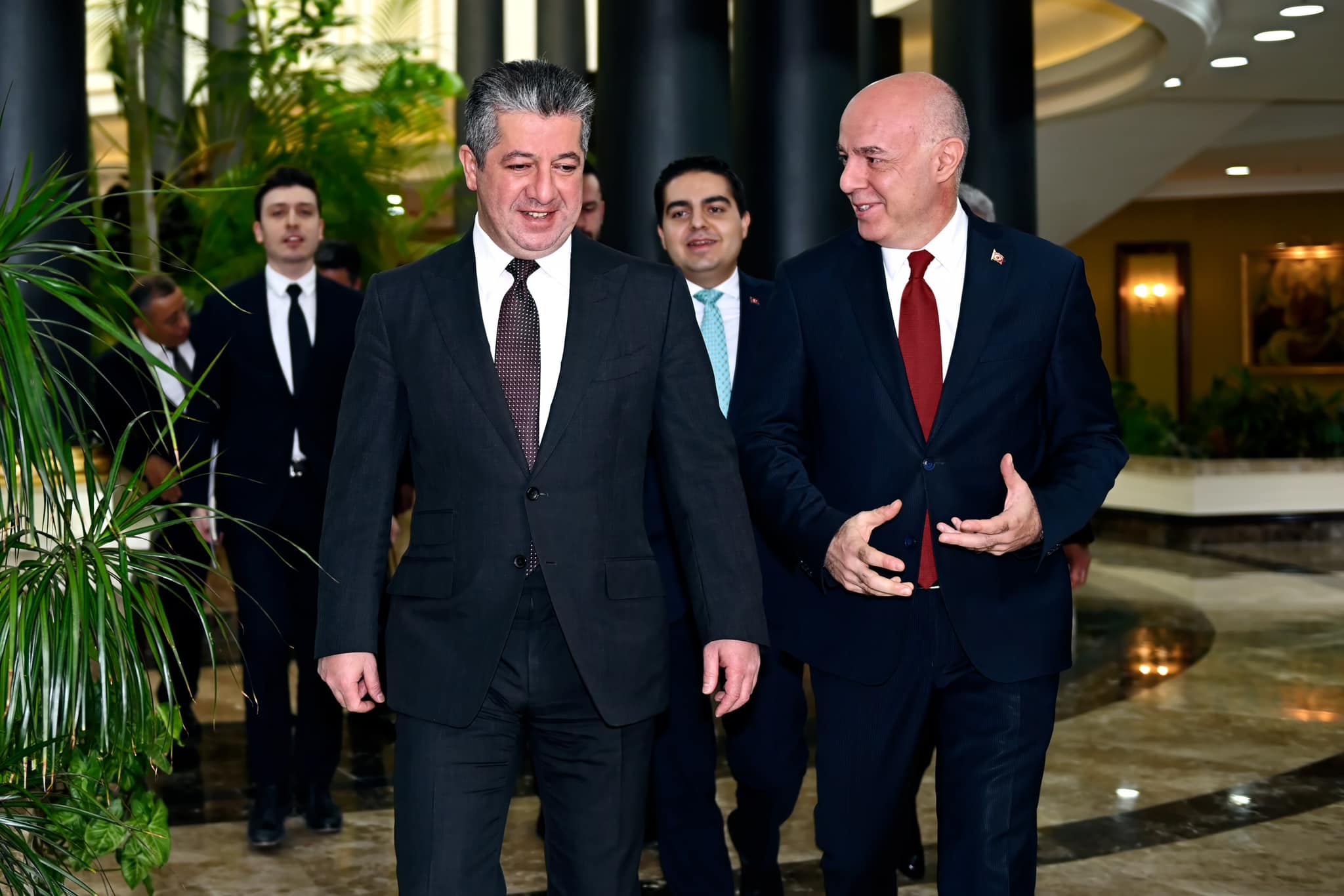 Kurdistan Region Prime Minister Masrour Barzani (left) walking alongside Turkish Ambassador to Iraq Ali Riza Gunney, Oct. 9, 2022. (Photo: KRG)