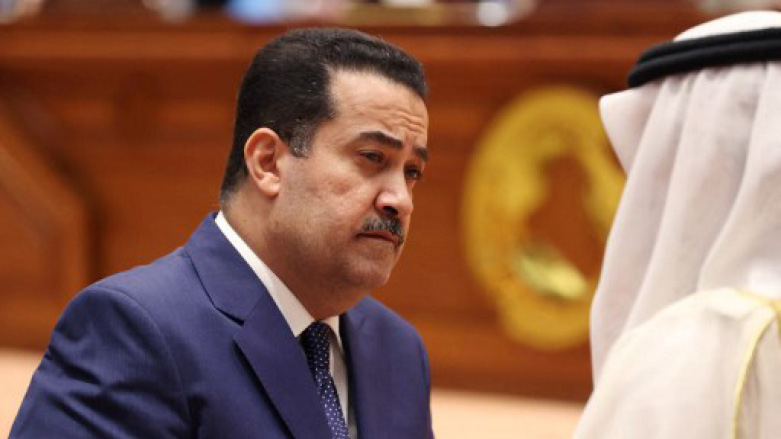 Mohammed Shia al-Sudani (L), a candidate for Iraq's prime minister position, speaking to an unidentified official in the capital Baghdad, Oct. 13, 2022. (Photo: Iraqi parliament/ Ho / AFP)