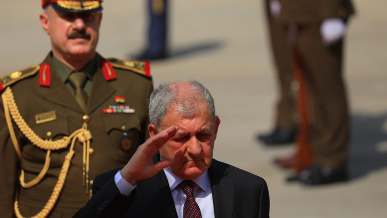 Iraq's new president Latif Rasheed salutes during a handover ceremony in capital Baghdad, Oct. 17, 2022. (Photo: Anadolu Agency)