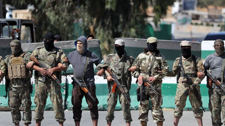 HTS fighters (Photo: OMAR HAJ KADOUR/AFP)