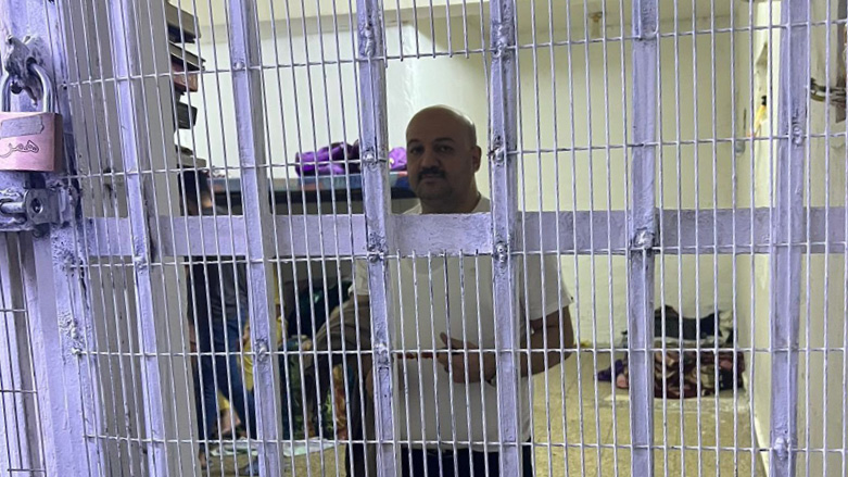 Nour Zuhair Jassem, an Iraqi businessman suspected of being a culprit in the unprecedent theft of $2.5bn, is pictured behind jail bars, Oct. 24, 2022. (Photo: Iraqi Social media networks)