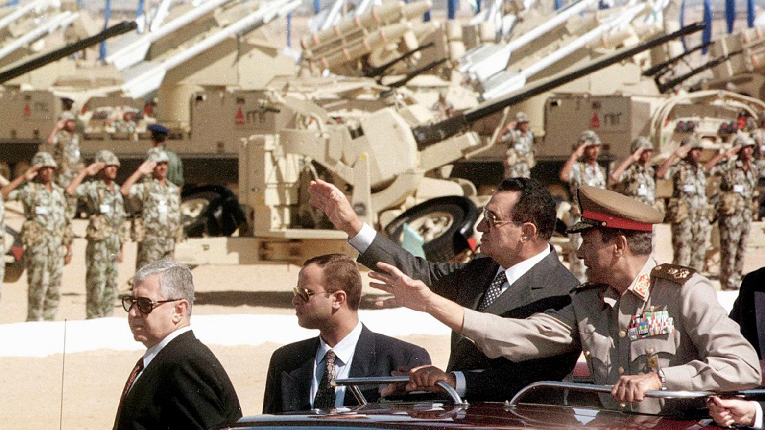 Egypt's President Hosni Mubarak (2nd-R) review Egyptian soldiers during a military parade outside Cairo to mark the 25th anniversary of the 1973 Arab-Israeli war, Oct. 6, 1998. (Photo: Amr Nabil/AFP)