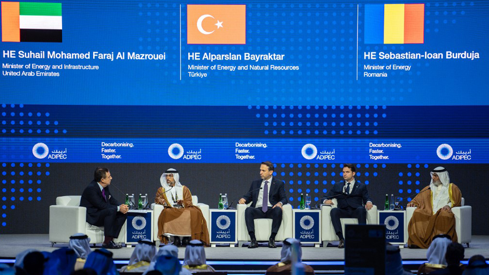 US Journalist John Defterios, UAE, Turkey, and Romanian energy ministers at a panel in UAE's Abu Dhabi,  Oct. 2, 2023. (Photo: Ryan Lim/AFP)