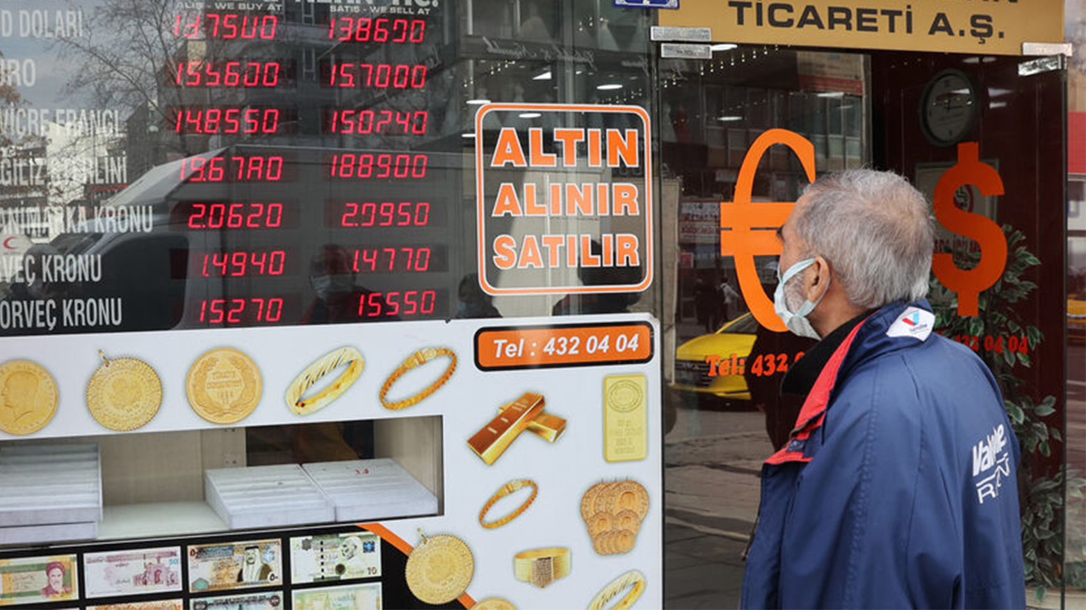 A man looks at exchange rates outside an exchange office in Ankara, Turkey, on Feb. 23, 2022. (Photo: Adem Altan/ AFP)