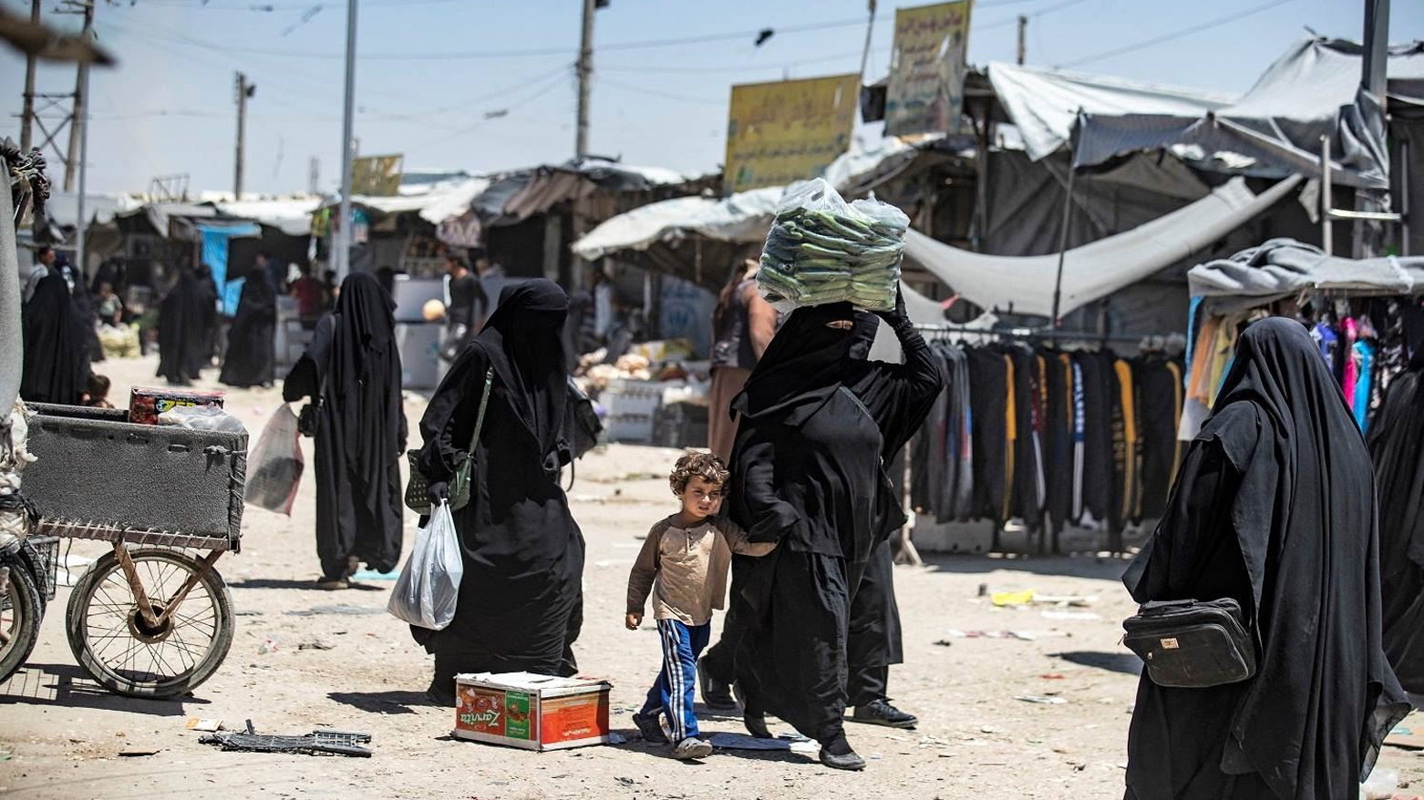 Women are pictured at Kurdish-led al-Hol camp, where ISIS family members are residing in northeast Syria, June 23, 2021. (Photo: Delil Souleiman/AFP)