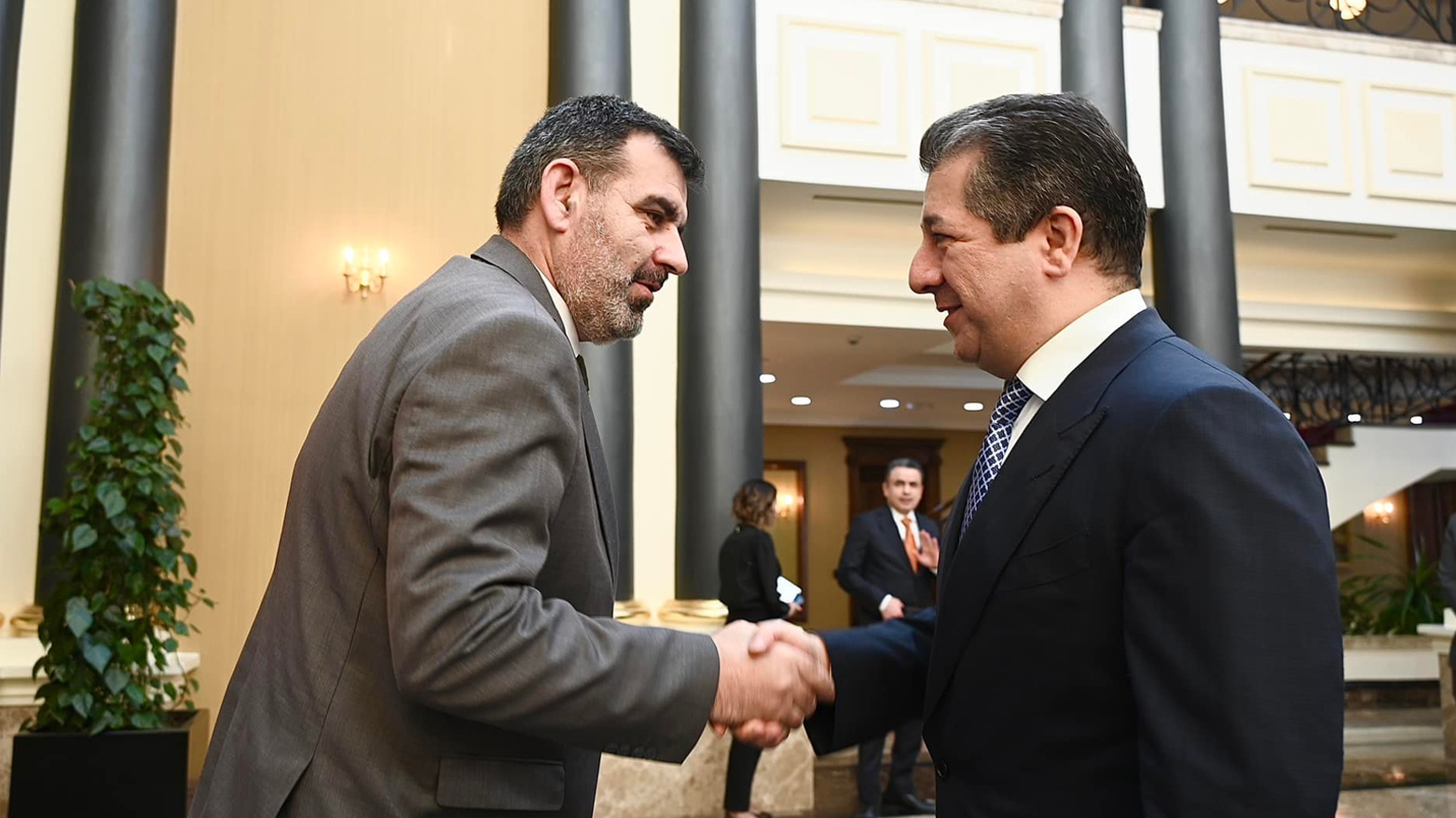 Kurdistan Region Prime Minister Masrour Barzani (right) is pictured shaking hands with outgoing Armenian Consul General Arshak Manoukian in Erbil, Oct. 7, 2023. (Photo: KRG)