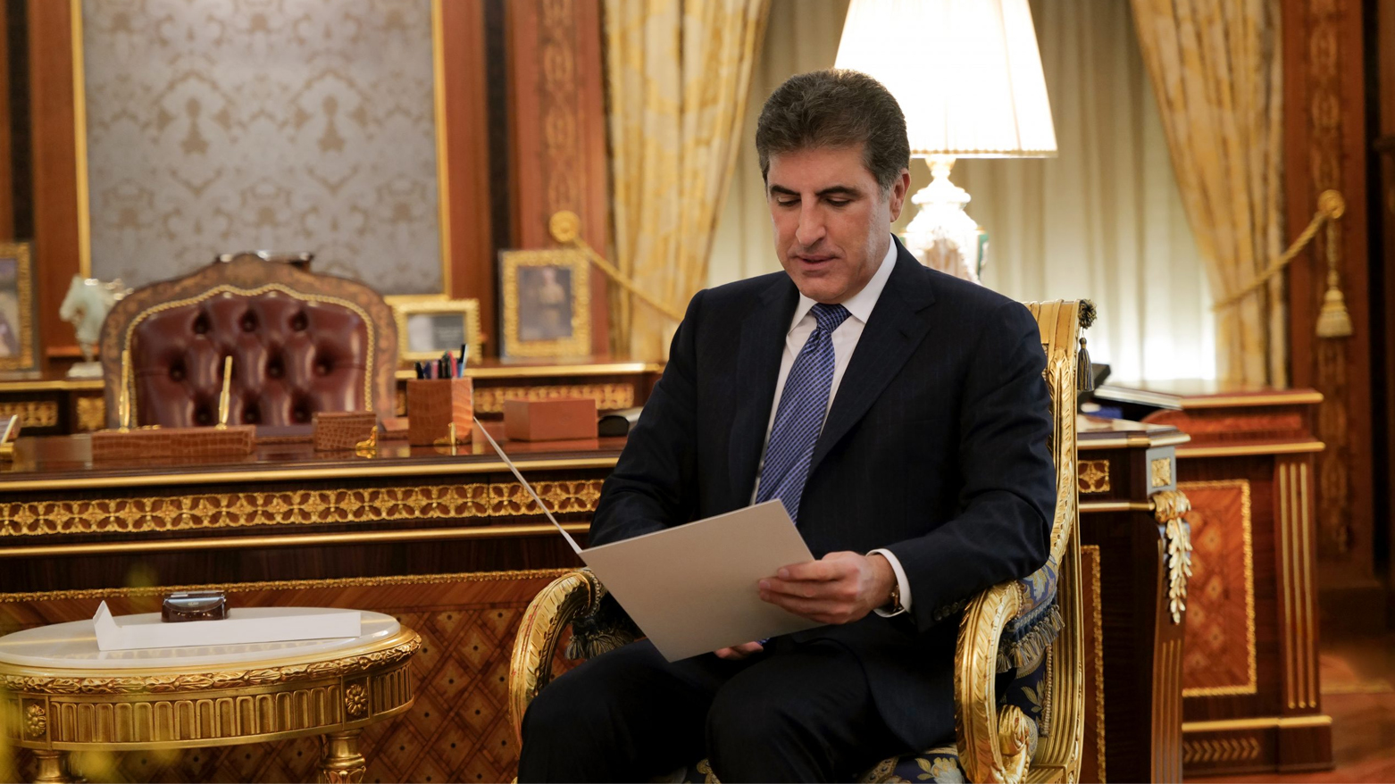Kurdistan Region President Nechirvan Barzani is pictured reading an official invitation letter from the UAE President Mohamed bin Zayed Al-Nahyan to attend COP28 climate change conference in Dubai=, Oct. 8, 2023. (Photo: Kurdistan Region Pr