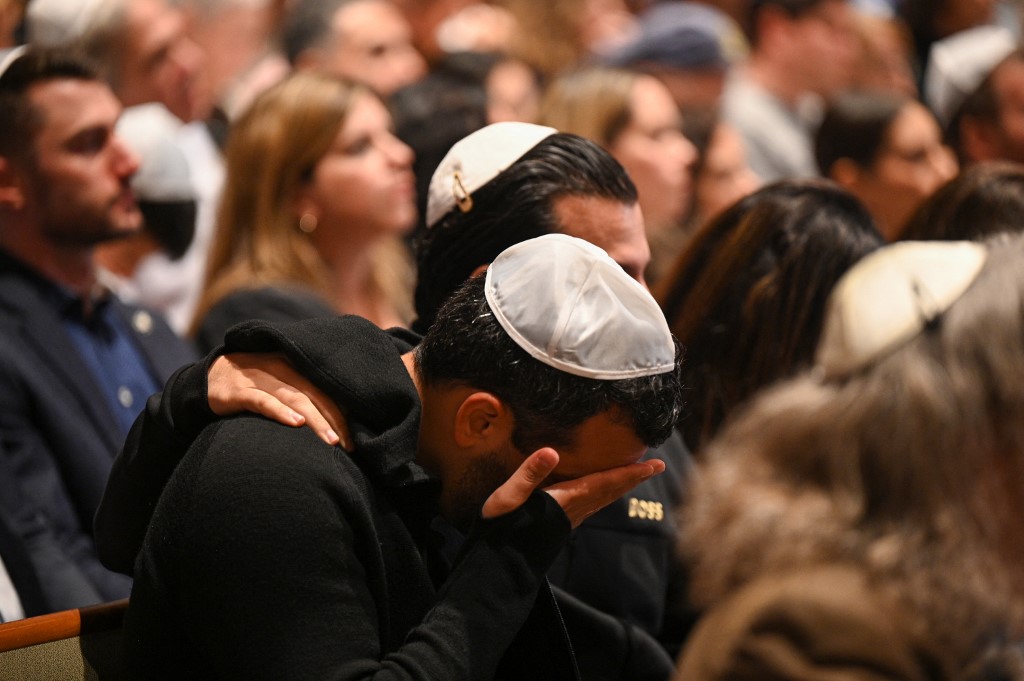 People attend a vigil for Israeli victims at the Stephen Wise Temple, in Los Angeles, California after the Palestinian militant group Hamas launched an attack on Israel, Oct. 8, 2023. (Photo: Robyn Beck/AFP)
