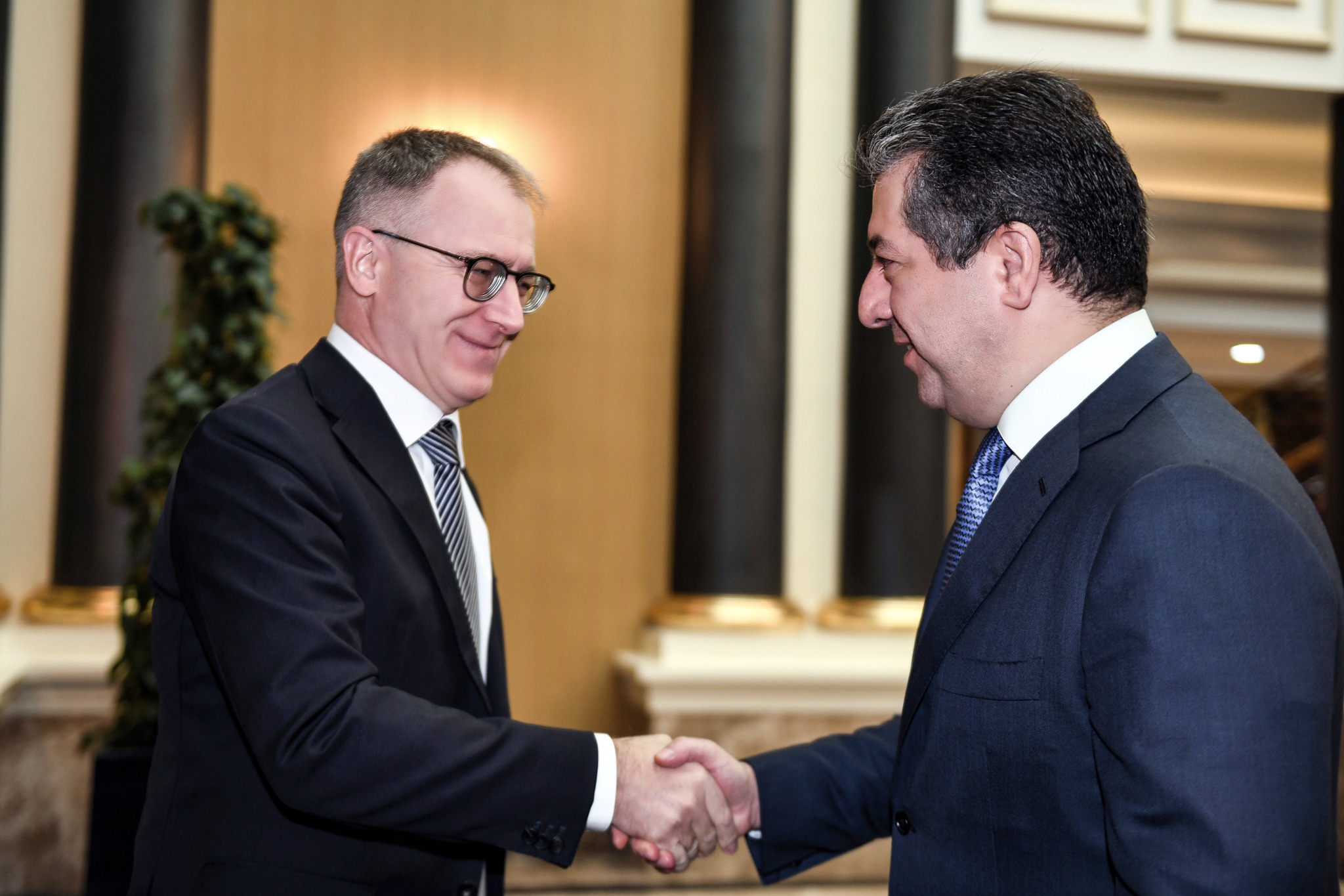 Kurdistan Region Prime Minister Masrour Barzani (right) is pictured shaking hands with Italy’s Ambassador to Iraq Maurizio Greganti in Erbil, Oct. 10, 2023. (Photo: KRG)