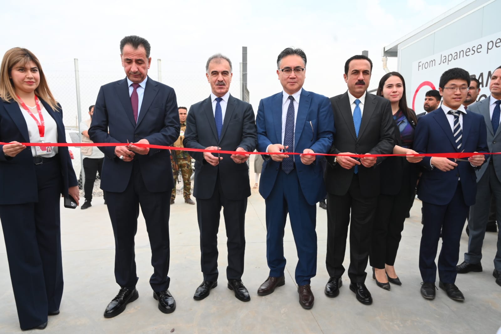 Japanese Ambassador to Iraq Ambassador Futoshi Matsumoto (fourth from right) cutting opening ribbon of Al-Ula school in Erbil along with local and KRG officials, Oct. 19, 2023. (Photo: Erbil Governorate)