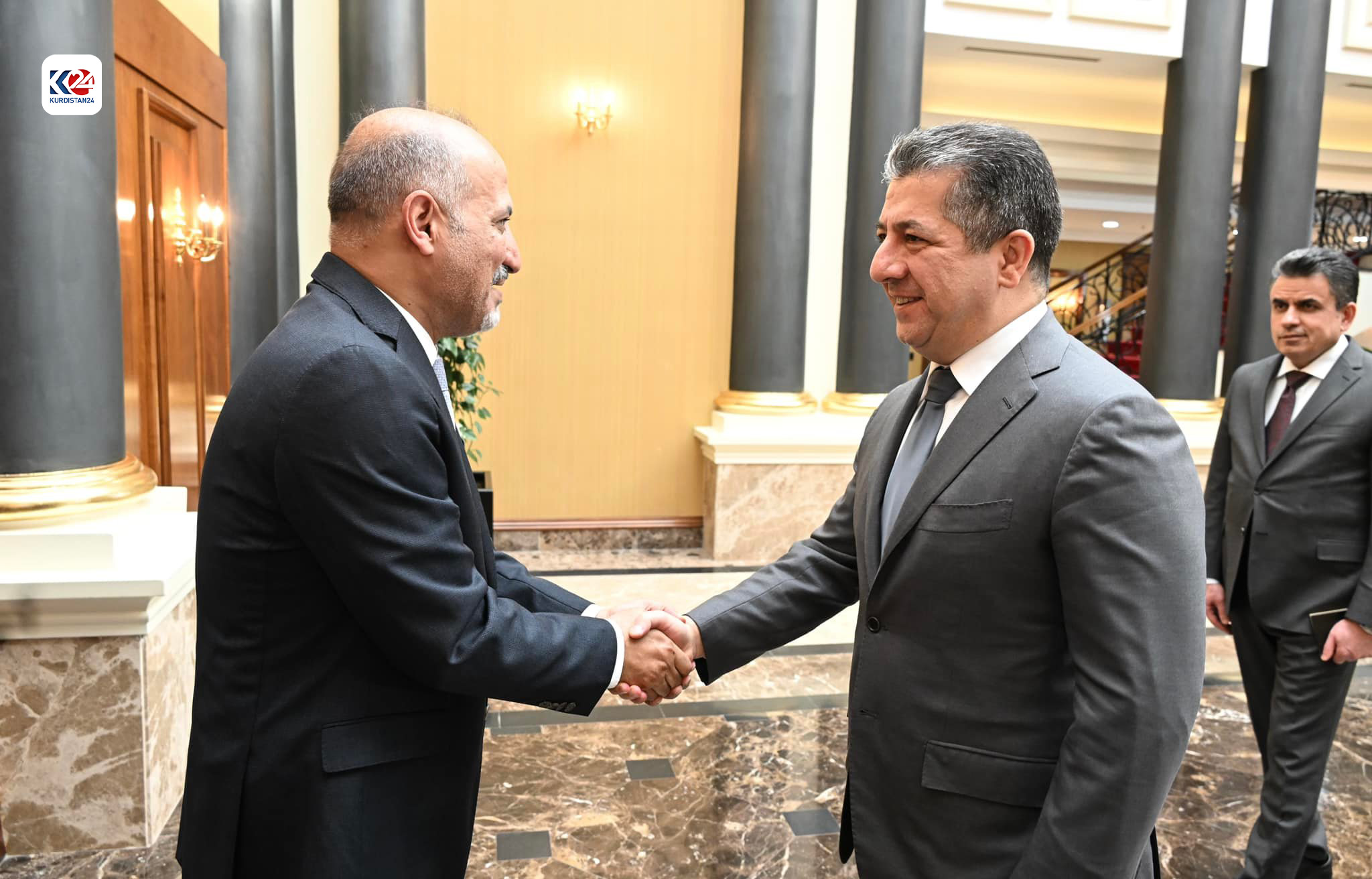 Kurdistan Region Prime Minister Masrour Barzani (right) shaking hands with Ahmad Jarba, the leader of Syria's Tomorrow Movement, Oct. 23, 2023. (Photo: KRG)