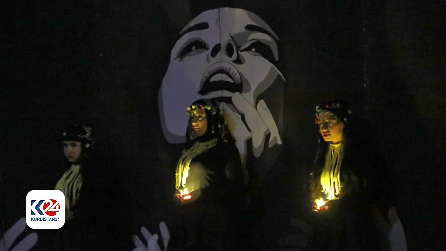 The performers at the ‘Women and Life: Inseparable Twins’ event held candles in solidarity with women's suffrage, Oct. 25, 2023 (Photo: Kurdistan 24)