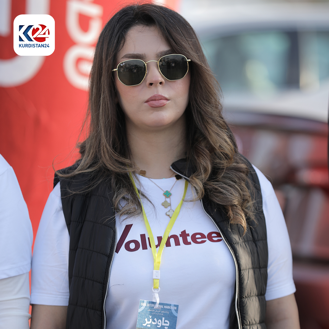 A volunteer of the Erbil Marathon Organization posing for a photo Oct. 27, 2023. (Photo: Kurdistan 24) 