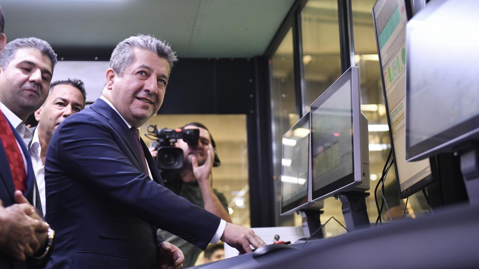 Kurdistan Region Prime Minister Masrour Barzani is pictured operating a machine at Fabyab packaging factory in Erbil, Sept. 31, 2023. (Photo: KRG)