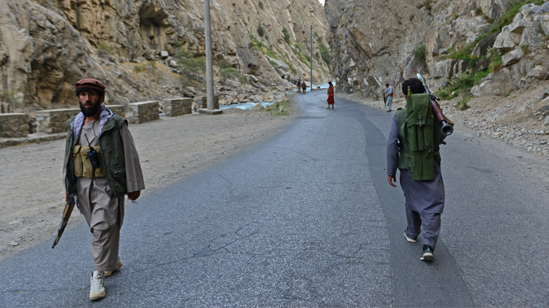 Afghan resistance movement and anti-Taliban uprising forces personnel patrol along a road in Rah-e Tang of Panjshir province,  August 29, 2020. (Photo: Ahmad Sahel Arman/AFP)