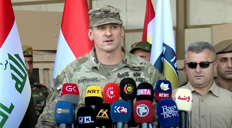 Col. Todd Burroughs speaking at Wednesday’s press conference for the distribution ceremony of 150 military vehicles for the Kurdish Region’s Peshmerga forces. (Kurdistan 24)