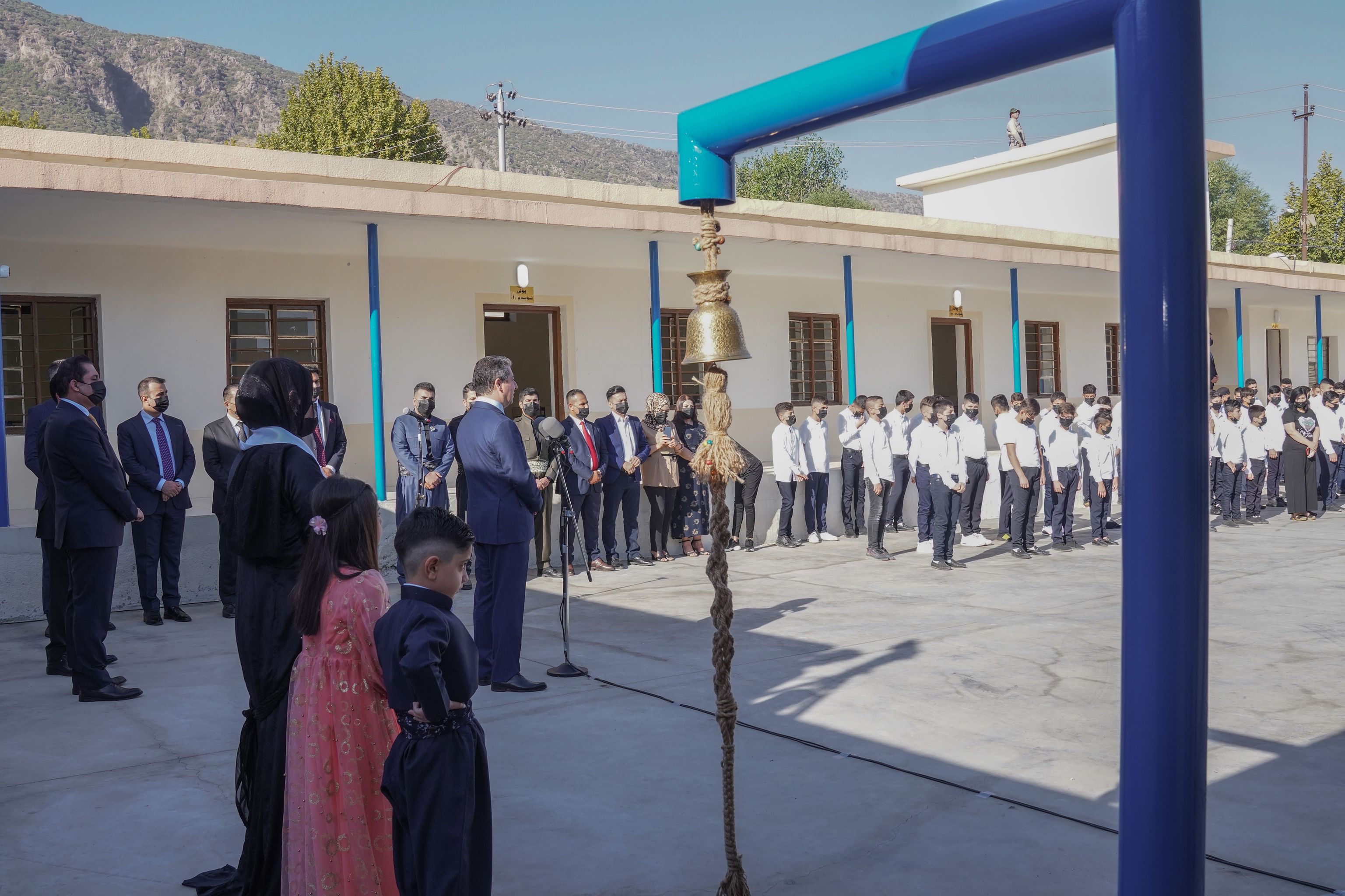 Students and teachers are pictured while listening to KRG Prime Minister Masrour Barzani's speech at the new school year ceremony, Sept. 14, 2021. (Photo: KRG)