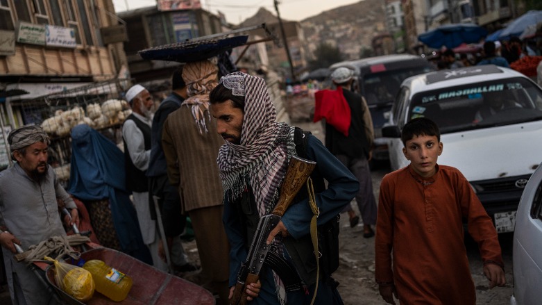Taliban fighters patrol a market in Kabul's Old City, Afghanistan, Tuesday, Sept. 14, 2021. (Photo: AP / Bernat Armangue)