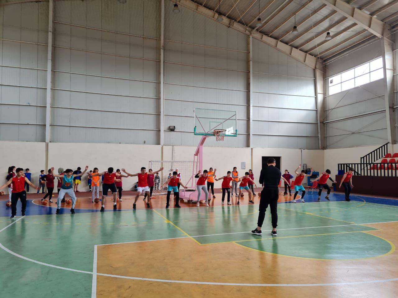 Members of the Talent Sports Academy (TSA) playing basketball. (Photo: Goran Sabah Ghafour)