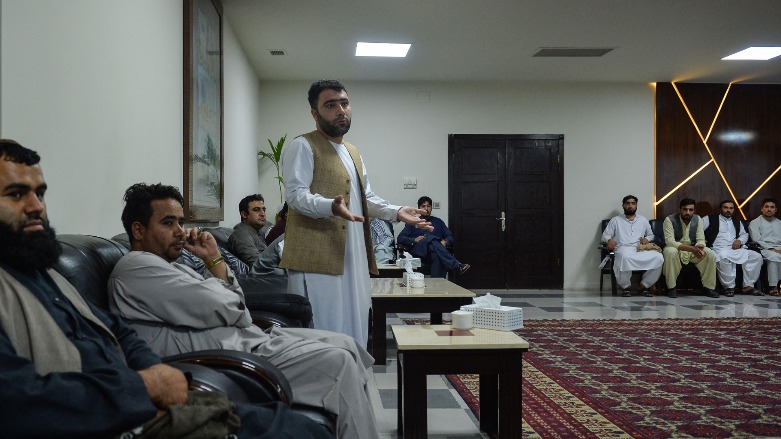 A trader speaks in the office of Herat Chamber of Commerce in Herat, Sept. 19, 2021. (Photo: Hoshang Hashimi / AFP)