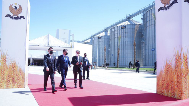 KRG PM Masrour Barzani is pictured walking to cut the inauguration ribbon, Sept. 27, 2021. (Photo: KRG)