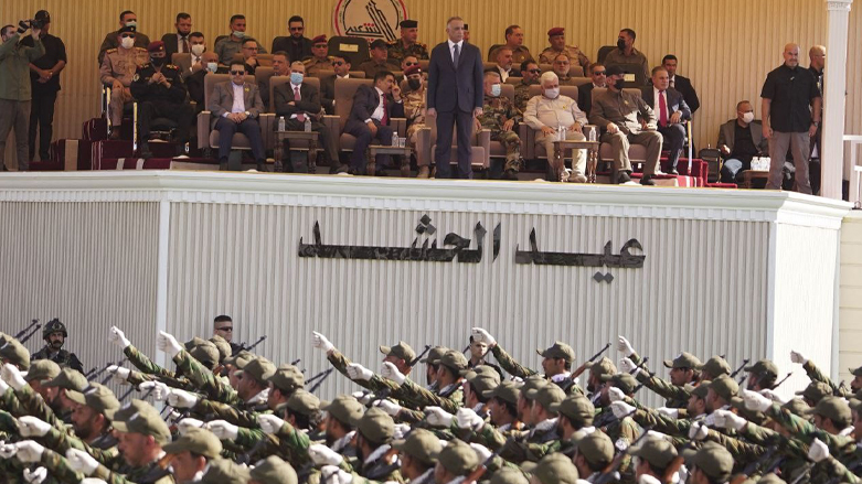 Iraqi Prime Minister Mustafa al-Kadhemi attends a parade by members of the Iranian-backed Hashed al-Shaabi forces celebrating the 7th anniversary of their founding  in Diyala province, June 26, 2021. (Photo: AFP Photo / HO/ Hashed al-Shaabi