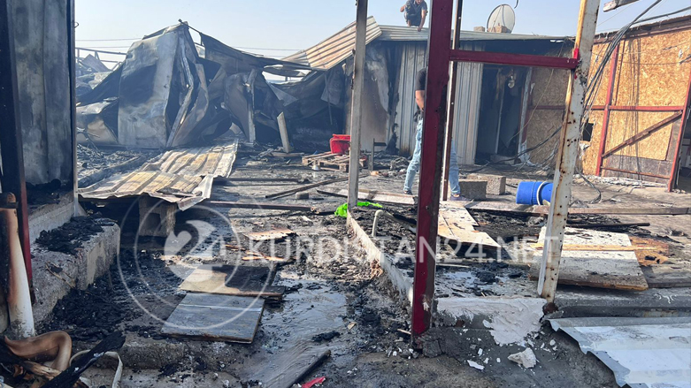 A house has been burnt down by an inferno in Erbil's Harsham Camp, Sept. ٦, 2022. (Photo: Renas A. Saeed/Kurdistan 24)