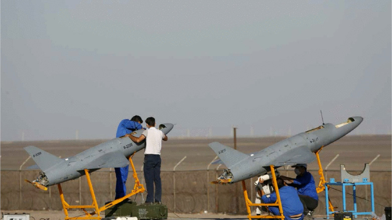 Technicians prepare drones for launching during an Iranian military exercise. (Photo: Iranian Army office/AFP)