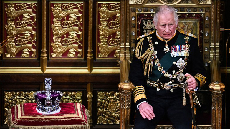 Britain's Prince Charles, former Prince of Wales (R) sits by the The Imperial State Crown (L) in the House of Lords Chamber, during the State Opening of Parliament, in the Houses of Parliament, in London, May 10, 2022. (Photo: Ben Stansall/