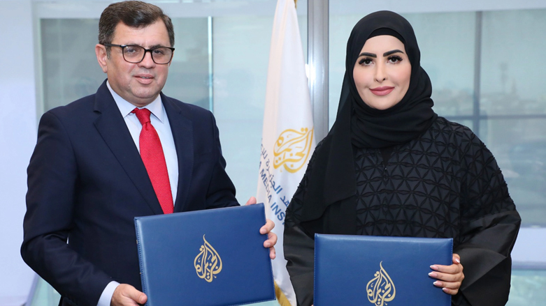 Ahmed Zawiti (left), the chief executive officer of Kurdistan 24 Company for Media and Research, poses for a photo with Al-Jazeera Media Institute's director, Eman Al-Amri, in the Qatari capital Doha, Sept. 27, 2022. (Photo: Kurdistan 24)