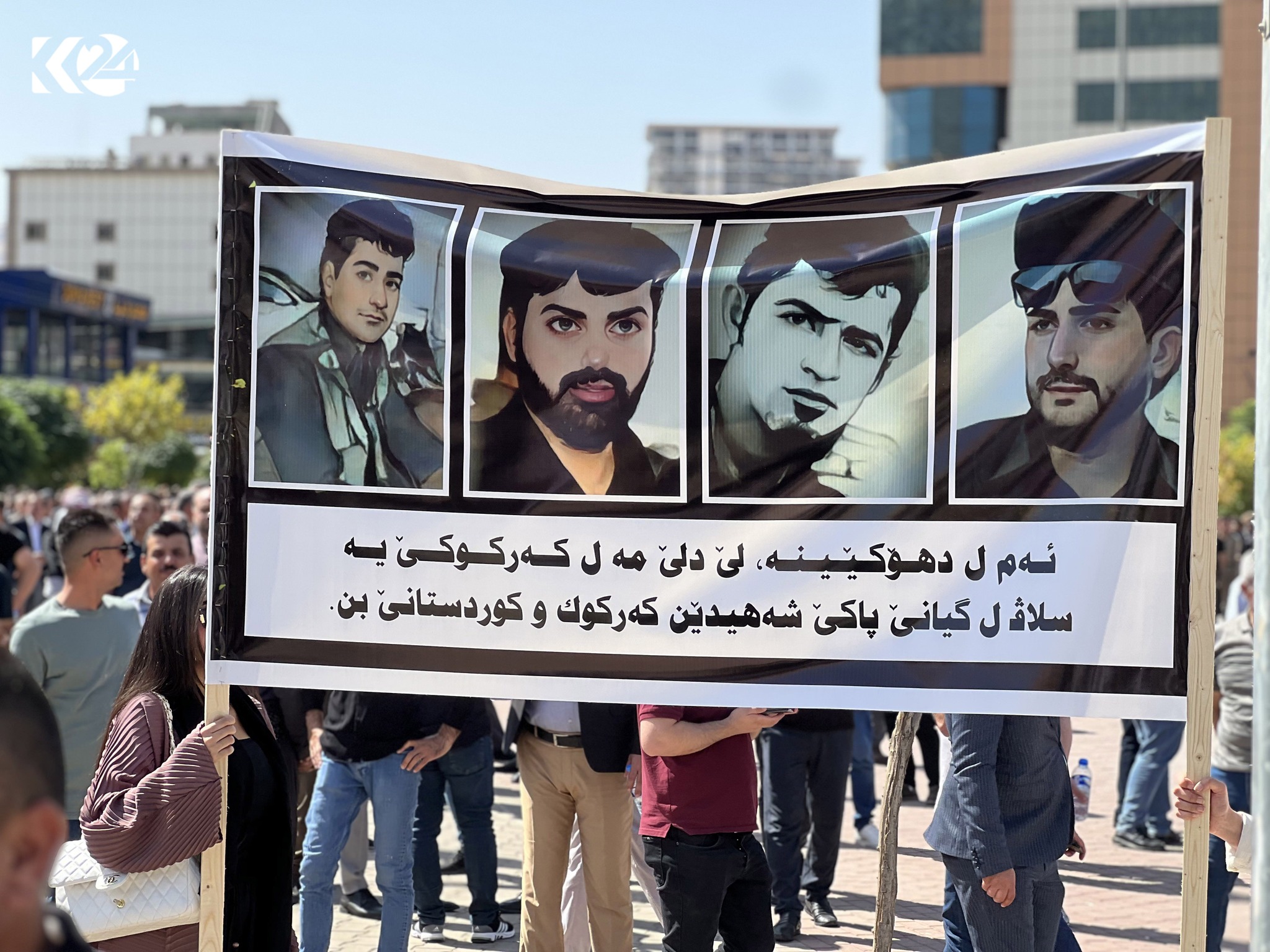 A poster of the four protesters killed in Kirkuk. (Photo: Kurdistan 24)