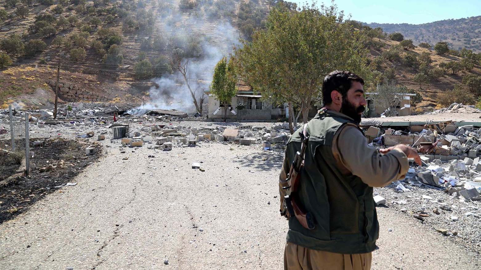 A Komala Party fighter is pictured following Iranian Kamikaze drone attacks on the Kurdish militant group's headquarters in Sulaimani province's Zirgwez, Sept. 28, 2022. (Photo: AFP)