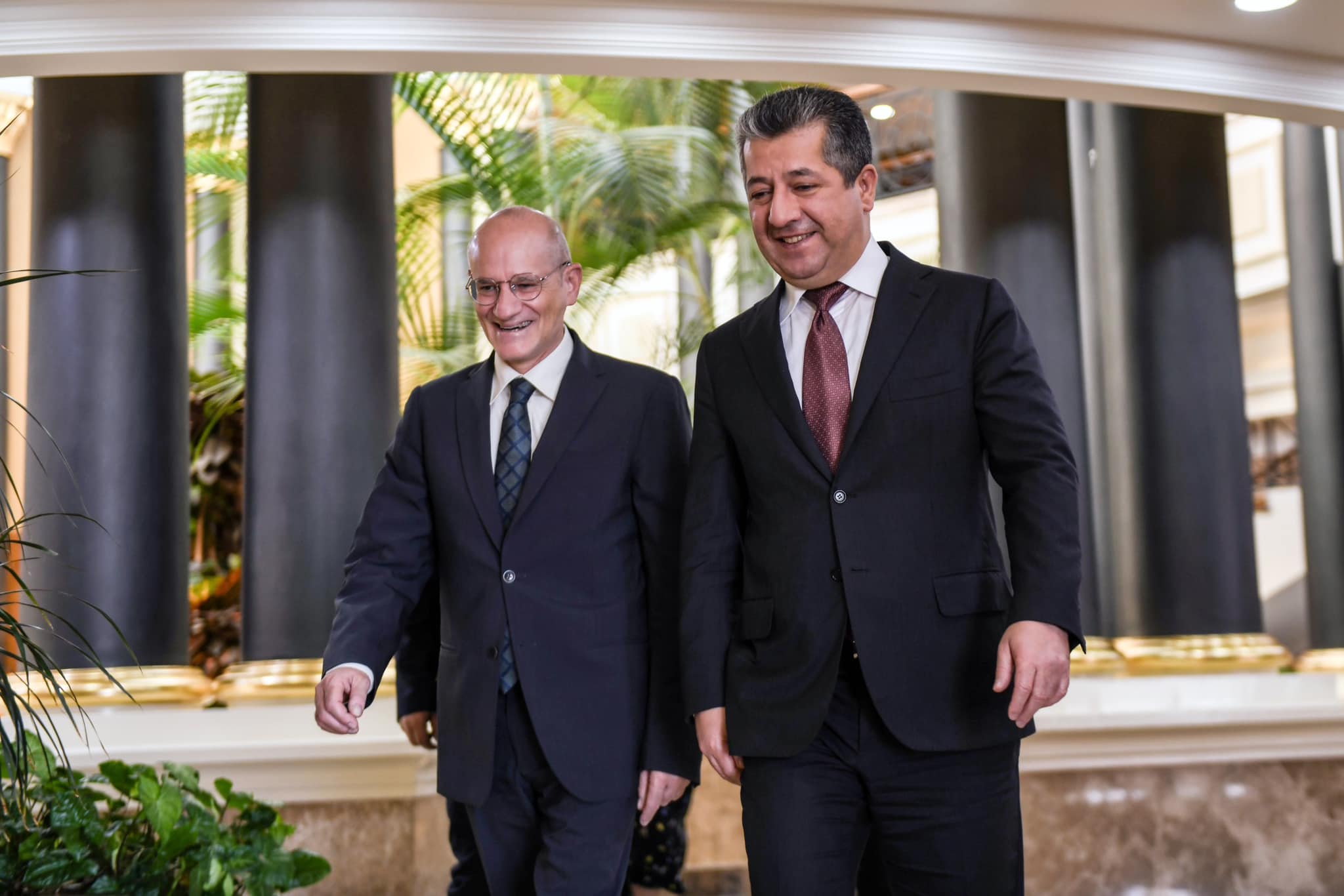 Kurdistan Region Prime Minister Masrour Barzani (right) walking alongside Emberti Gialloreti Leonardo of Community of Sant'Egidio in Erbil, Sept. 17, 2023. (Photo: KRG)