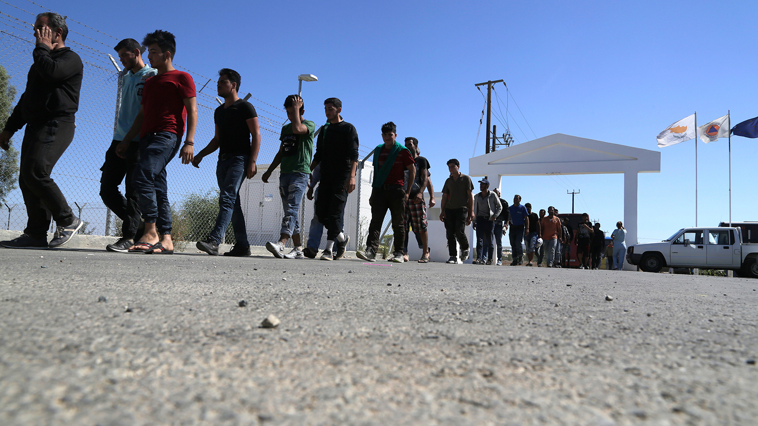 Migrants from Syria walk towards a refugee camp at Kokkinotrimithia, outside of the capital Nicosia, in the eastern Mediterranean island of Cyprus on Sunday, Sept. 10, 2017. (Photo: Petros Karadjias/ AP)