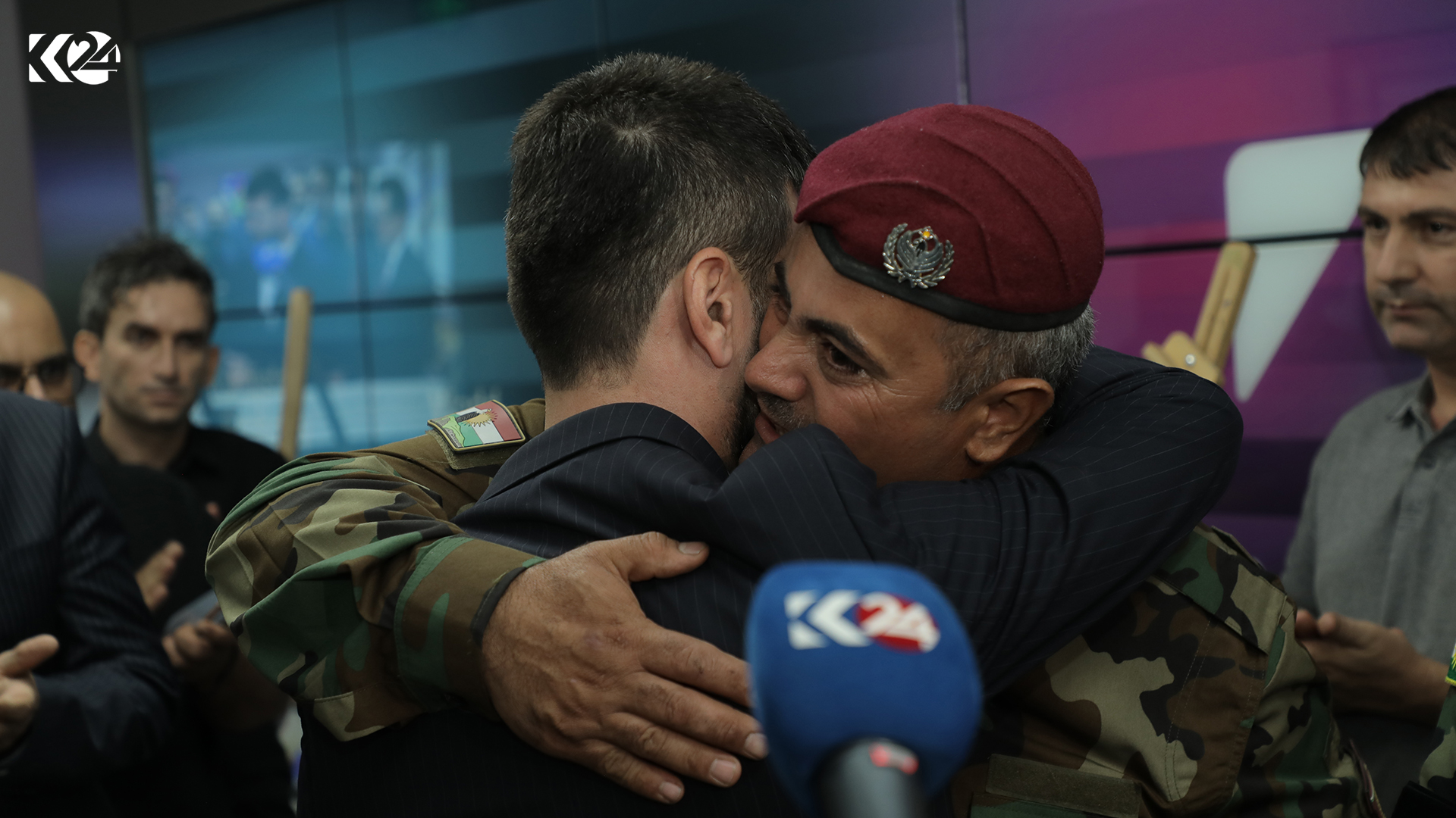 Kurdistan 24 Kirkuk reporter Soran Kamaran is seen hugging one of the Peshmerga members who saved his life in the aftermath of the Iranian attacks in Sept. 2022 in southern Erbi, Sept. 28, 2023. (Photo: Kurdistan 24)