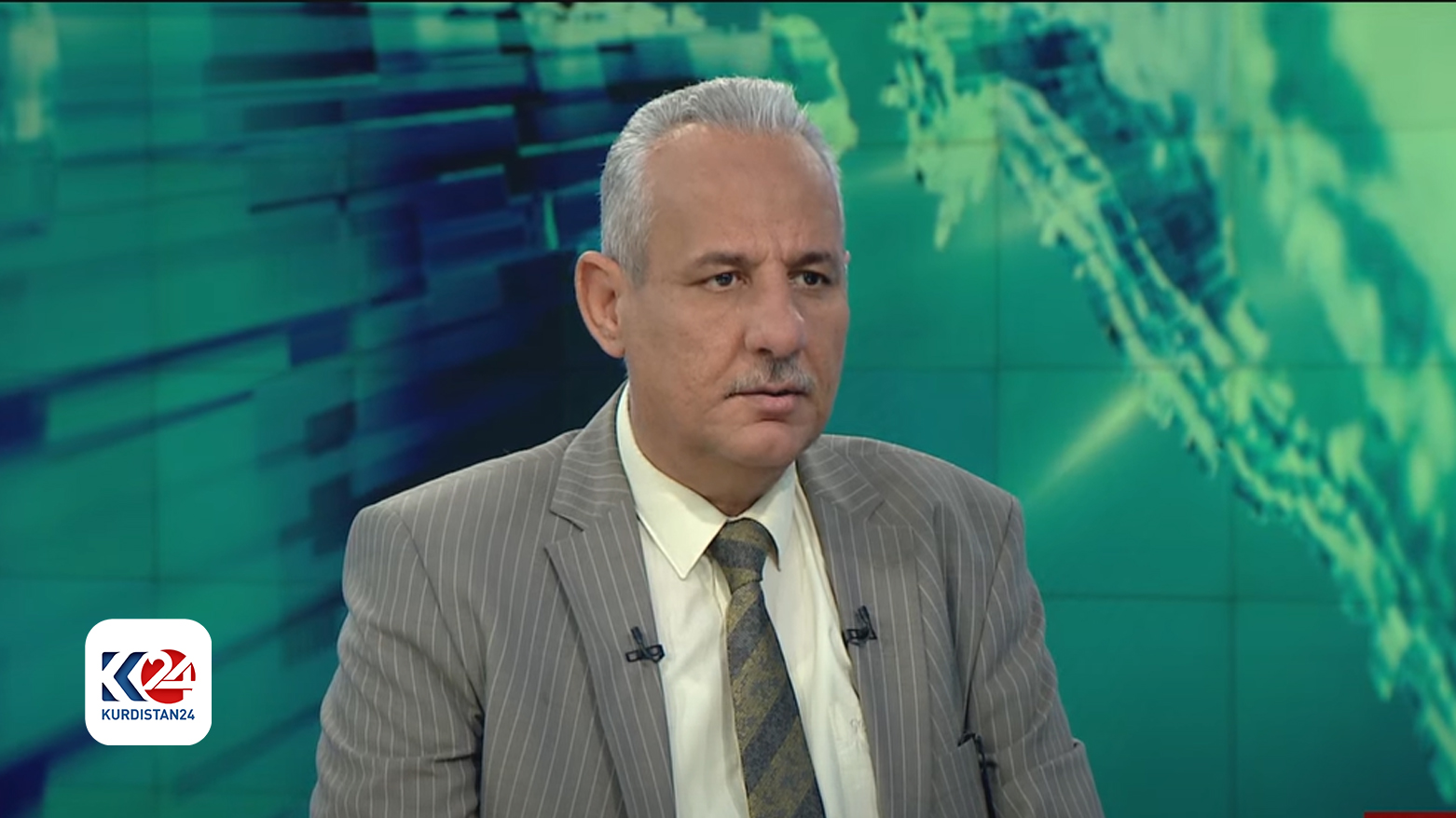 د. فیراس نەجماوی، شرۆڤەکاری سیاسی