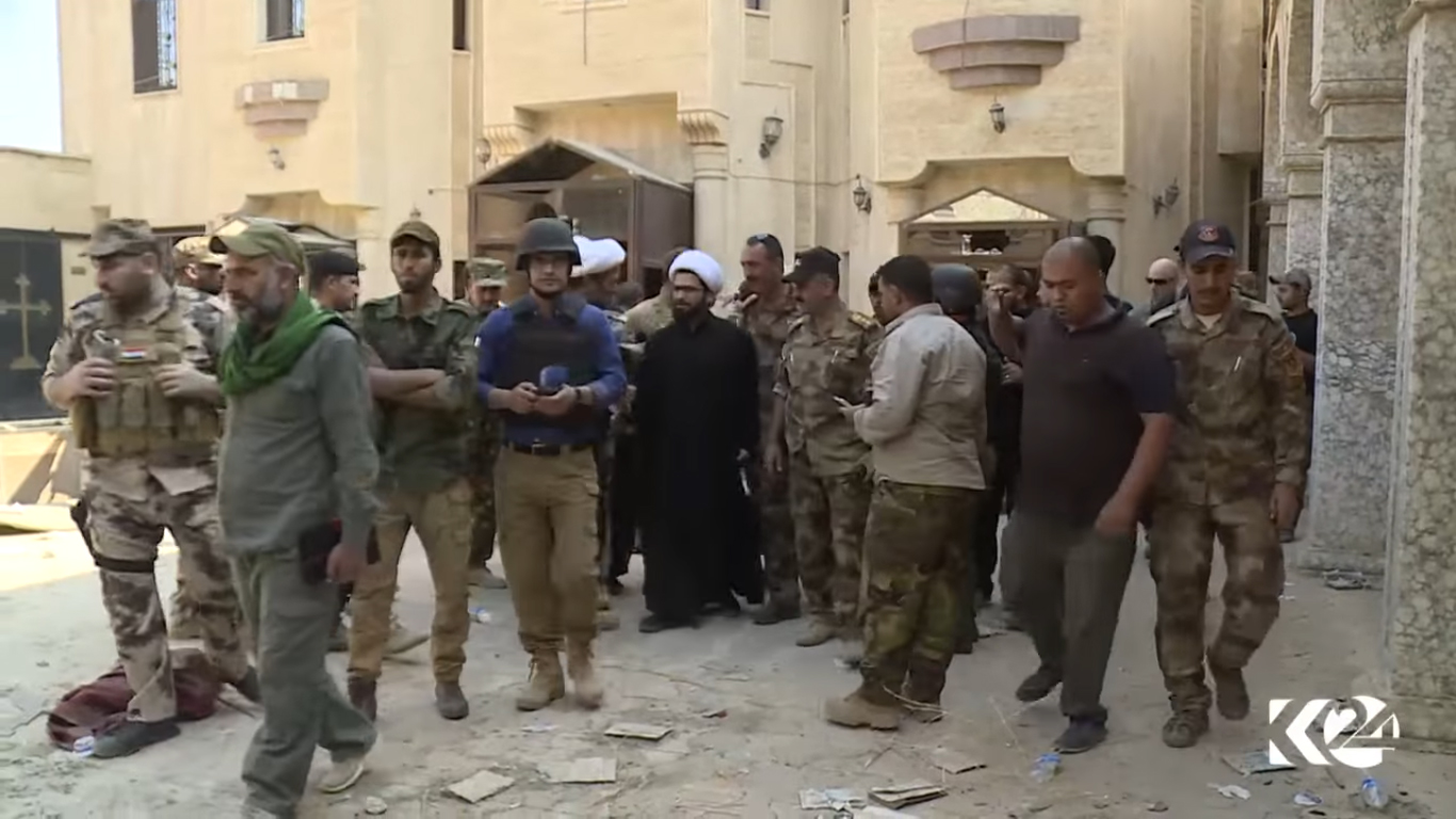 بالصور.. كوردستان24  تقرع أجراس إحدى كنائس برطلة بعد تحريرها 