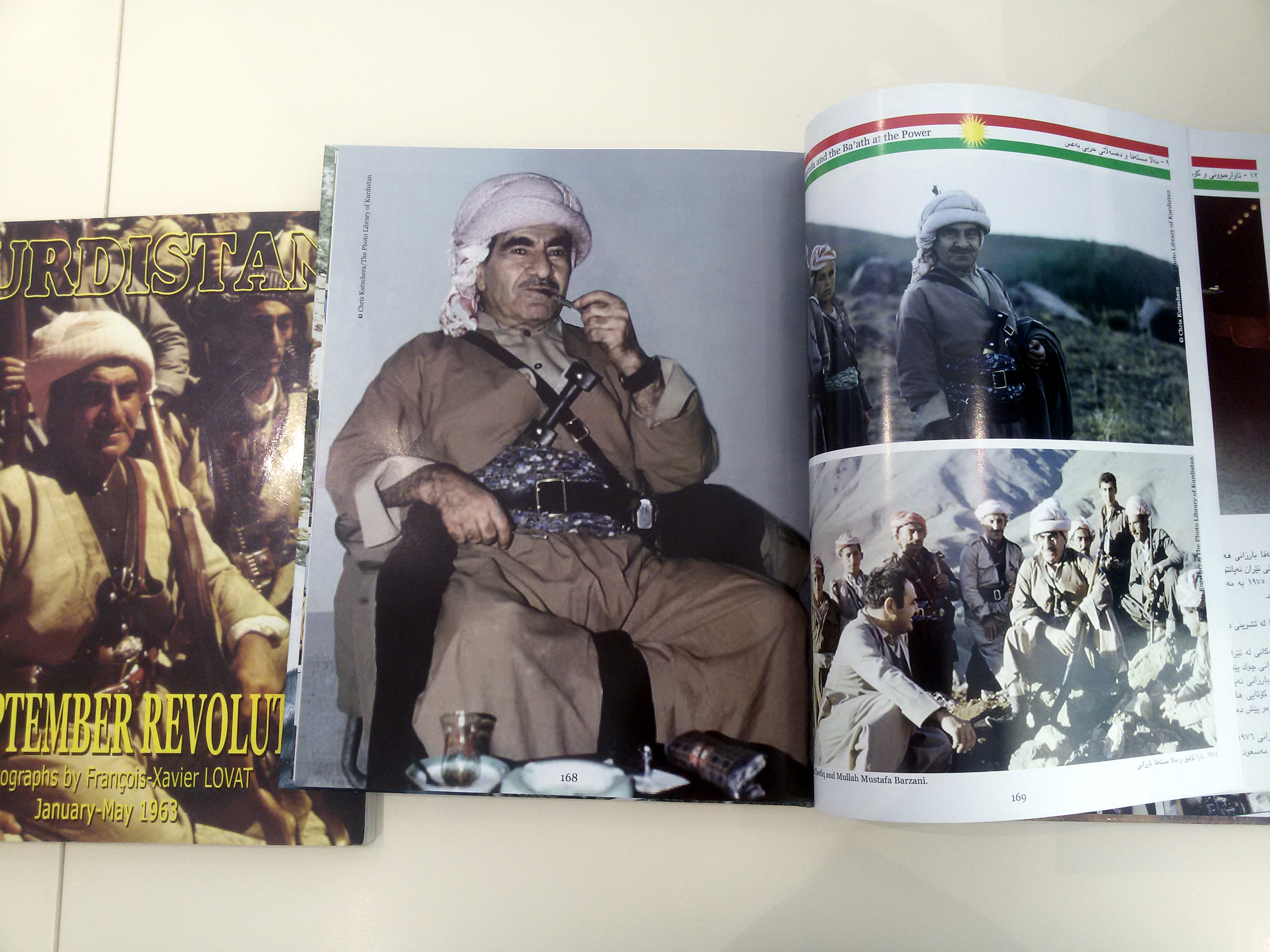 Shot of the French photographer and journalist Francois Lovat's books on the the late Kurdish leader Mela Mustafa Barzani, July 7, 2016. (Photo: Kurdistan24/Hisham Arafat)