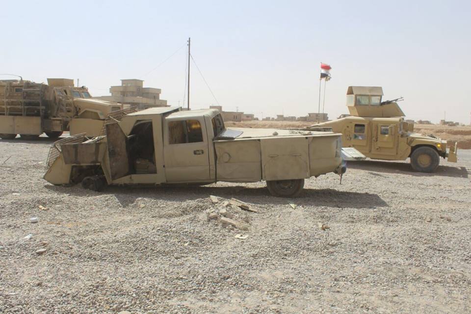 بالصور.. القوات العراقية تواصل تطهير قرى القيارة