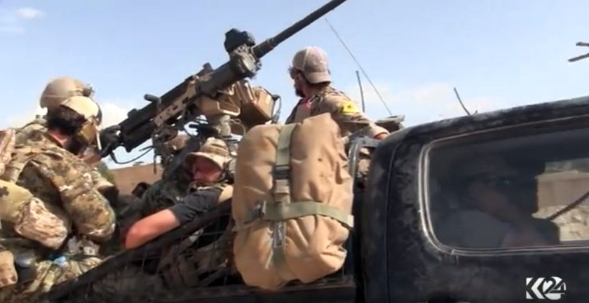 لێپرسینەوە لەو سەربازە ئەمریكیانە دەكرێت كە جلی یەپەگەیان پۆشیووە