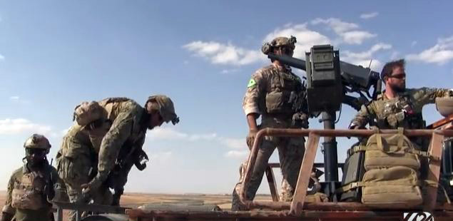 لێپرسینەوە لەو سەربازە ئەمریكیانە دەكرێت كە جلی یەپەگەیان پۆشیووە