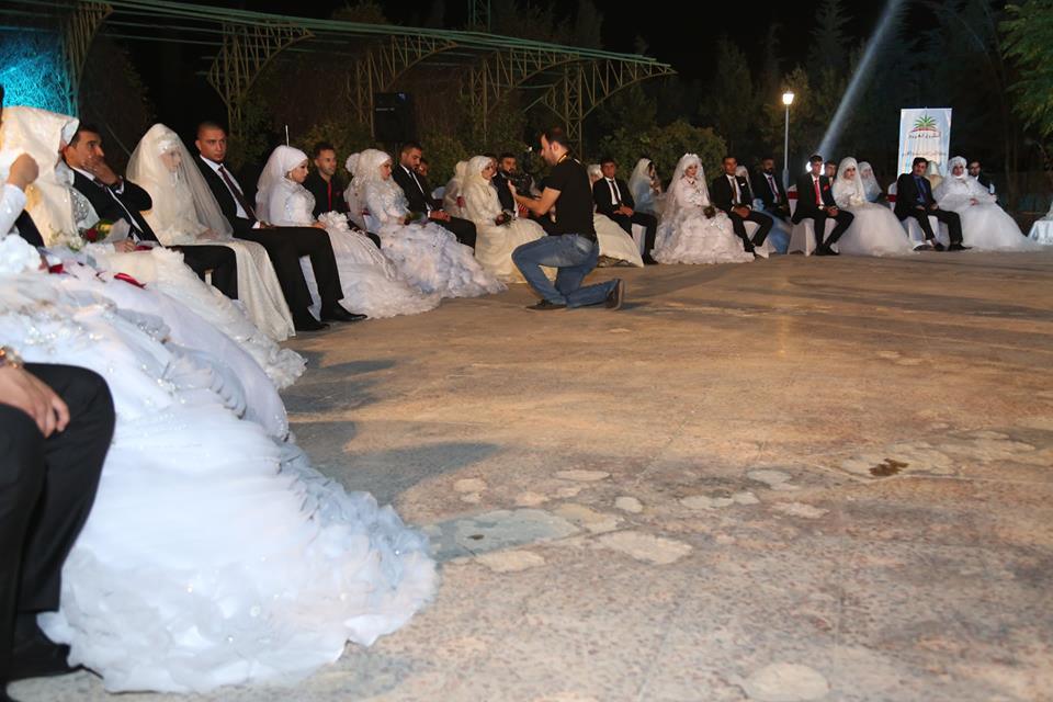 بالصور.. زفاف جماعي على انغام الدبكة العربية في اربيل