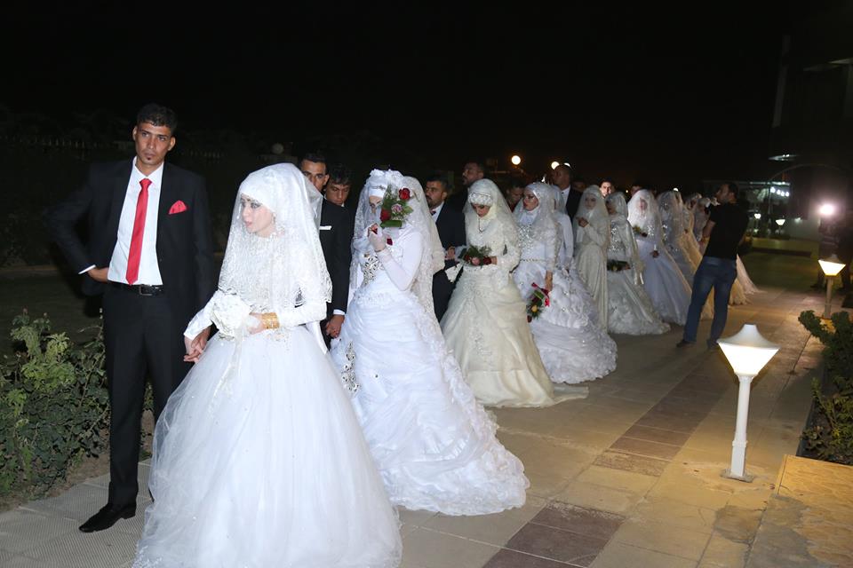 بالصور.. زفاف جماعي على انغام الدبكة العربية في اربيل