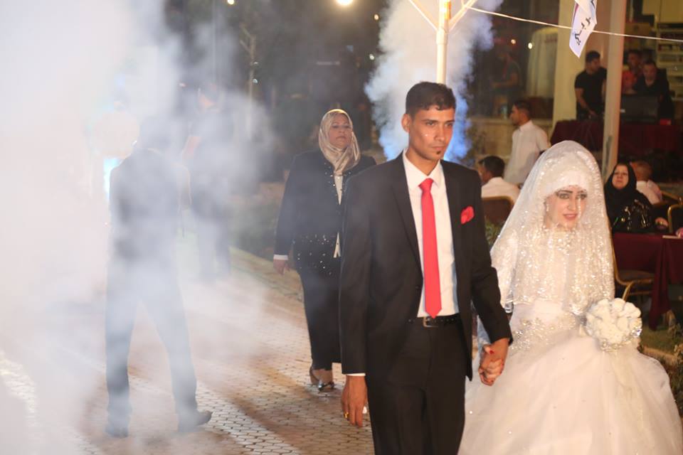 بالصور.. زفاف جماعي على انغام الدبكة العربية في اربيل
