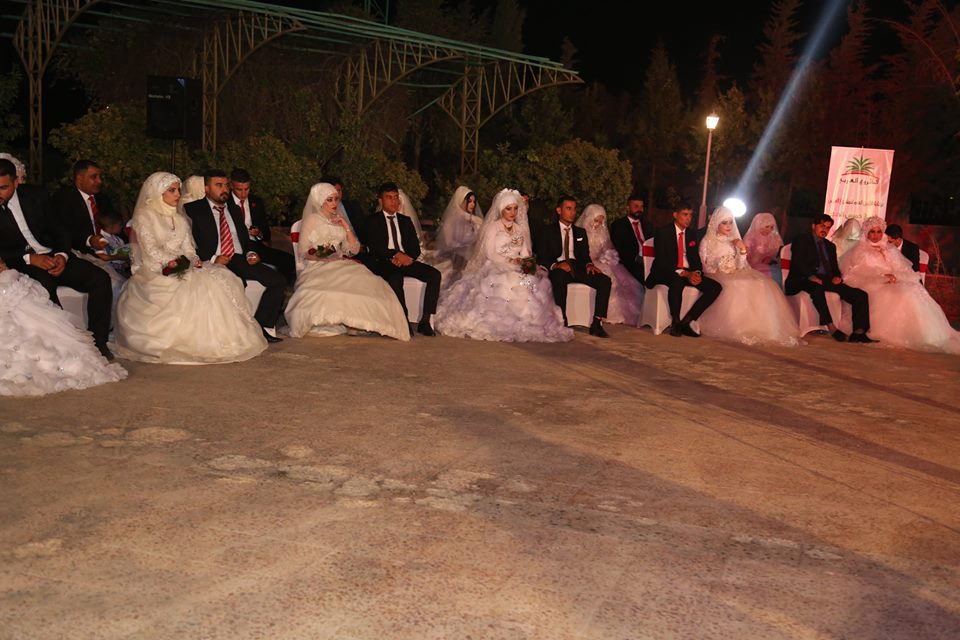 بالصور.. زفاف جماعي على انغام الدبكة العربية في اربيل