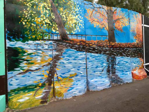 بالصور.. عراقيون يحولون الكتل الخرسانية الى لوحات فنية